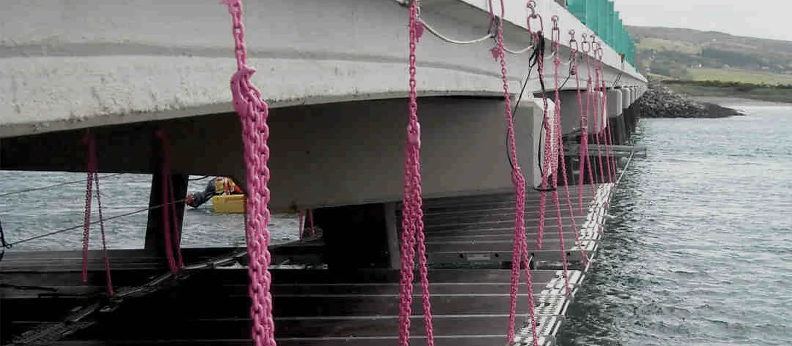 WEB Deck suspended access platform installed beneath a bridge